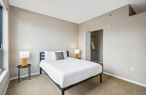Mill District Apartment | CozySuites Mill District with pool, gym # 09
