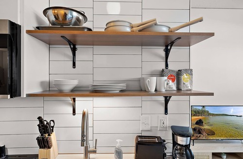 Warehouse District Apartment | CozySuites NLG with pool, bowling alley, sauna 27