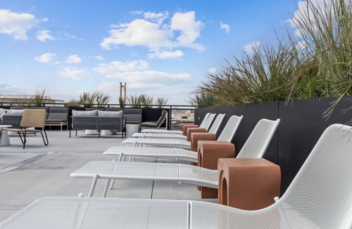 Warehouse District Apartment | CozySuites NLG with pool, bowling alley, sauna 27