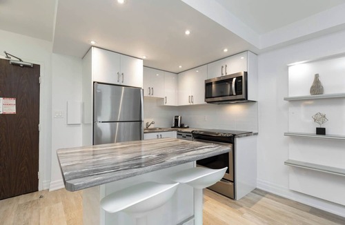 Bay Cloverhill Apartment | Discover an urban retreat in this spacious one-bedroom suite in Downtown Toronto