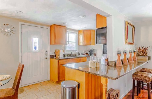 Golden Valley House | Dog-friendly home with unique decor, meditation room, firepit, patio & fireplace