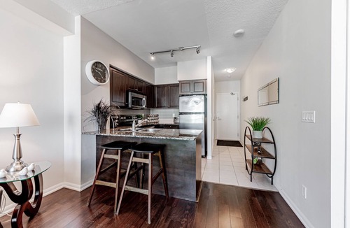 Bathurst Quay Apartment | Elegant Downtown Oasis with City and Lake Views Plus Parking!