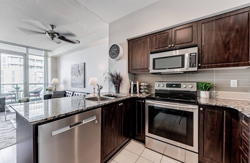Bathurst Quay Apartment | Elegant Downtown Oasis with City and Lake Views Plus Parking!