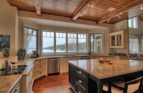 Seguin Cottage | Exquisite 5 Bdrm 4 Bath Cottage with Boathouse and Professional Gym! SW Views!
