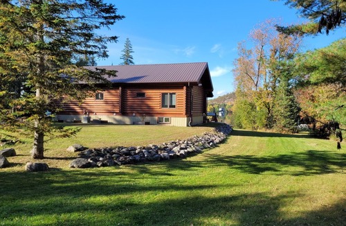 Golden Lake Cottage | Family Oriented waterfront Log Cabin with new hot tub and sauna.