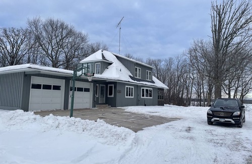 Kerrick House | Ferguson Farmhouses on Oak Lake with 176 feet of shoreline in Kerrick Minnesota.