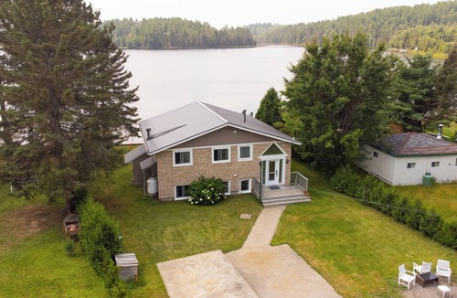 Sudbury District Cottage | Four Season Serene Lake House with Stunning Lake Views, Private Dock and Sauna.