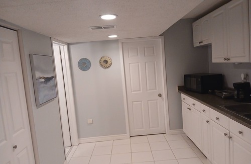 Lisgar Apartment | furnished basement studio, with1 queen bed, a kitchenette, and 1 bathroom. n