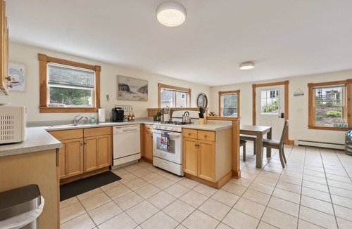 Ogunquit Condo | High Tide Cottage is located in town and just steps from Ogunquit Beach!