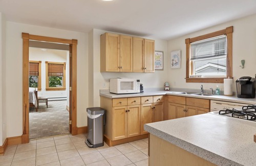 Ogunquit Condo | High Tide Cottage is located in town and just steps from Ogunquit Beach!