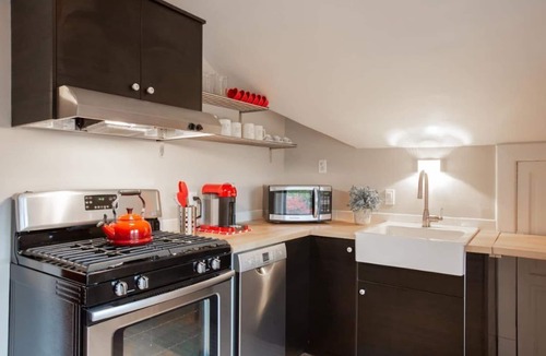 Lowry Hill East House | Historic Tudor Meets Modern Decor in Hip Uptown