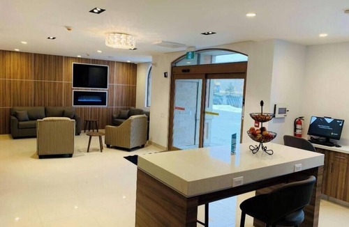 Northeast Mississauga Apartment | Hotel Chandni Victoria - King Room Disability Access