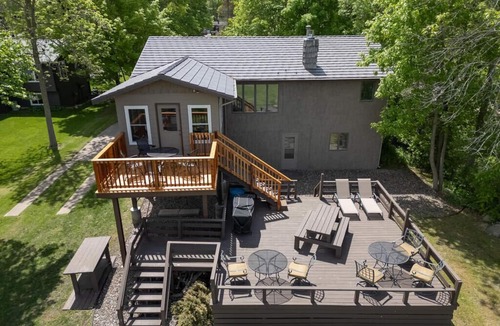 Isle House | Lake home, 3 bd 3 bath, 2 car garage deck, dock, Video game, foosball, quiet bay