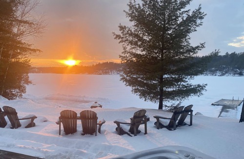 Leeds and the Thousand Islands Cottage | Lakefront, colourful sunsets, hot tub, arcade. Year round fun and relaxation.