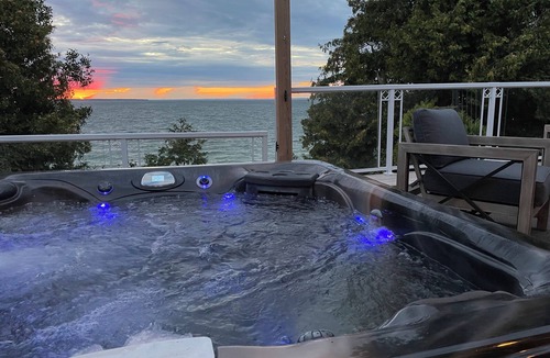 Brock House | Lakefront Cottage w/Hot Tub, BBQ Grill, Patio, Fire Pit, Dock, Sauna, Fire Place