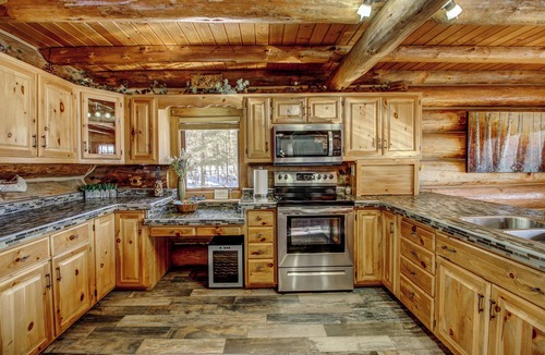 Nevis House | Lakeside Log Home with Pontoon & Game Room - Perfect for Families & Getaways!