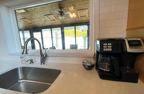 Webster House | Limited summer dates Lakefront sandy beach, sunroom, sauna, game room, kayaks!