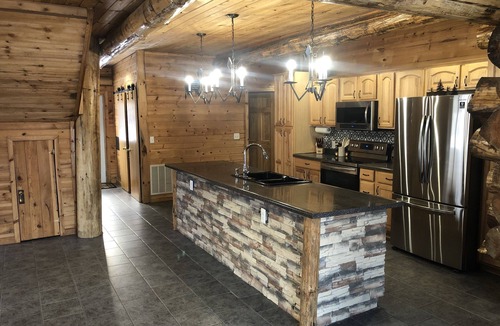 Brainerd House | Log home surrounded by woods near Upper South Long Lake