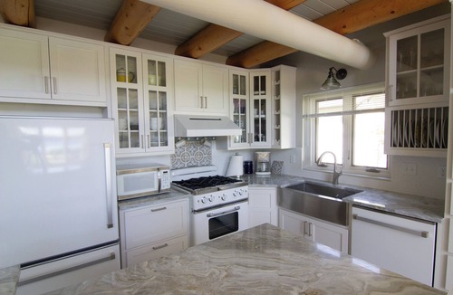 Moose Lake House | Luxurious Lakefront Log Home with Entertainment Building on Moosehead Laken