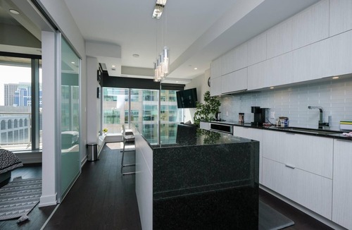 Byward Market - Parliament Hill Condo | Luxury one bedroom w patio steps from parliament