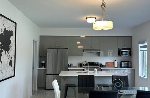 Cumberland Beach House | Menoke Modern Family Home with Game Room