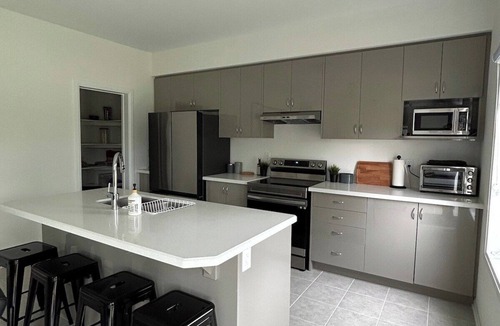 Cumberland Beach House | Menoke Modern Family Home with Game Room