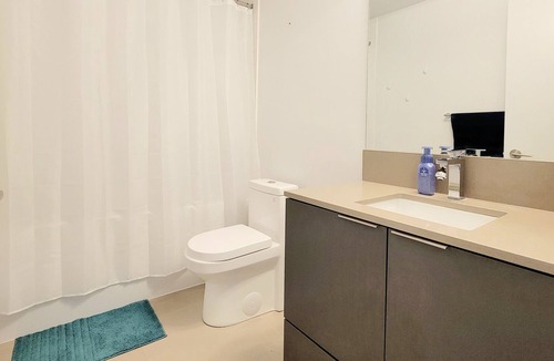 Garden District Condo | Modern 1+1 Bedroom Condo Steps Away from Vibrant Dundas Square