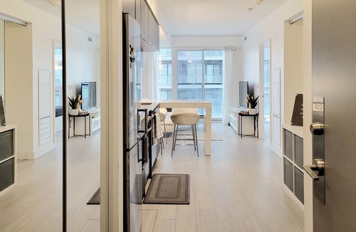 Garden District Condo | Modern 1+1 Bedroom Condo Steps Away from Vibrant Dundas Square