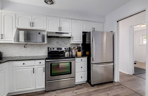 Windsor House | Modern 2BR with Remote Workspace, Patio, BBQ & Gym