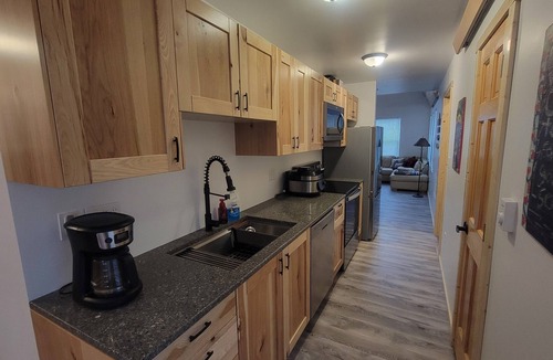 Longville Cabin | Modern Cozy Woman Lake Woodland Cabin, 24 acres, lakeshore, woodstove, AC, Wi-fi