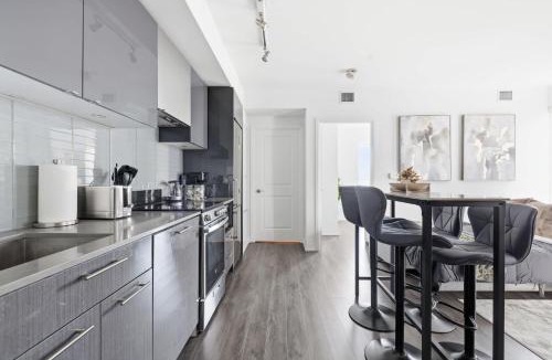 Garden District Apartment | Modern DT Condo Patio Walk Everywhere