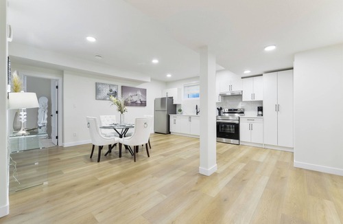 Southeast Edmonton Apartment | Modern & Elegant Executive Suite near Refinery Row. Office Desk + Kitchen