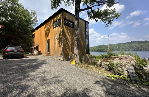 Algonquin Highlands Cottage | Modern Glass Cottage facing Lake with Hot tub