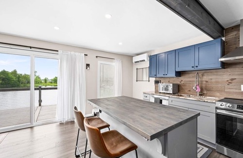 Duluth House | Modern Lakefront house, steps away from water's edge and Island Lake fishing