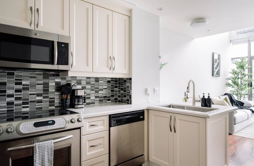 Bathurst Quay Apartment | Modern Lakefront Loft | Sunset Balcony