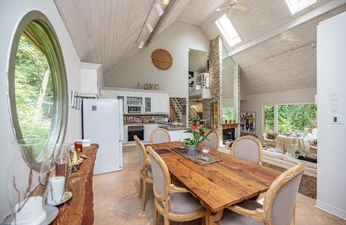 Caledon House | PARADISE OVERLOOKING THE BUBBLING CREDIT RIVER SURRONDED BY LUSH MATURE GARDENS