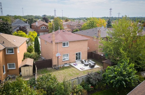East Credit House | PingPong Ridgeway Heartland BackyardFun KingBeds
