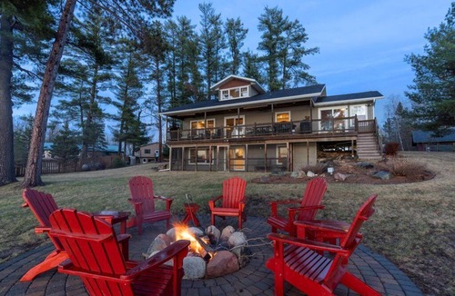 Emily House | Pristine home with sandy beach, firepit, dock and pontoon. ATV trails nearby.