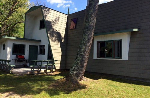 Waubun Cabin | Private Island with Lakefront Cabin on three sides