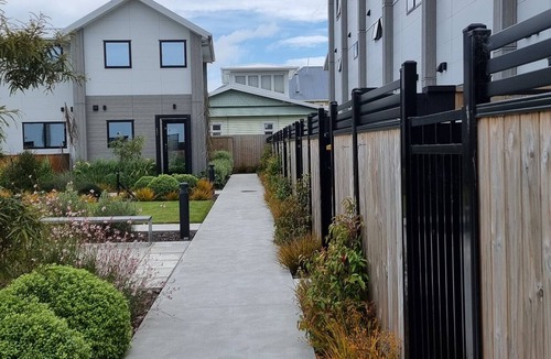 New Brighton House | Private studio room over the road from the beach, 2 mins to hot pools