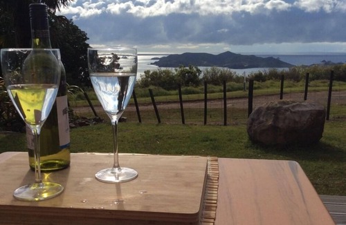 Matauri Bay House | Relax while taking in the expansive sea views