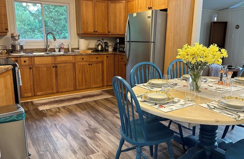 Georgian Bay Cottage | Renovated water front cottage w/firepit, multi level decks & screened in porch.