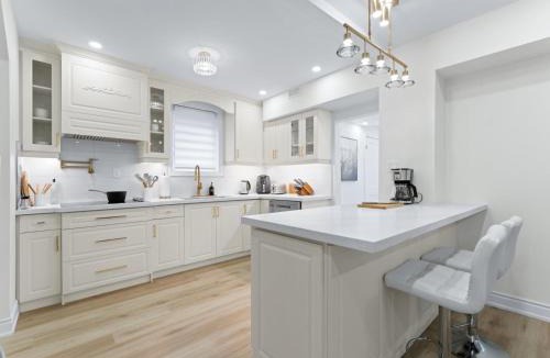 Old Mill House | Room with working space and queen bed in a Old mills luxury house