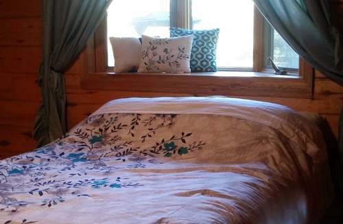 Finlayson House | Rustic Log Lodge Secluded acres with private lake & pond