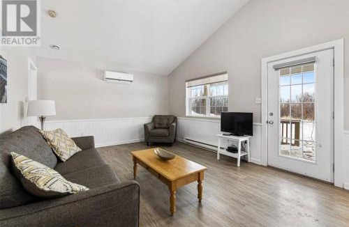 Cap-Pele Ski Chalet | Salt & Sand Cottage - Aboiteau Beach & Dunes