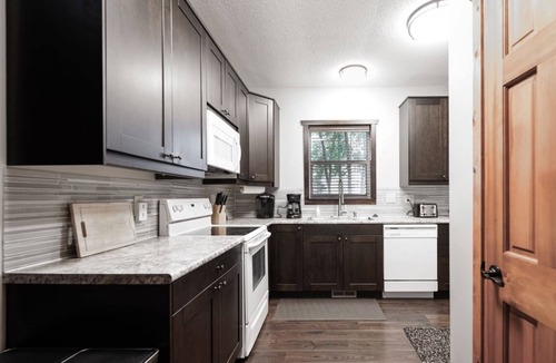 Sauk Centre House | SAUK LAKE RETREAT - 5BR w/private hot tub, dock, & boat