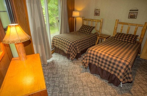 Puposky Cabin | Scenic Lakeside Octagon - Lake Views & Rustic Wood Stove