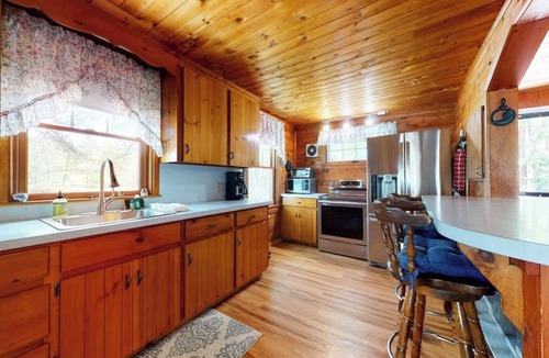 The Bays Cottage | Secluded bayfront cottage with private beach, grill, & bay views