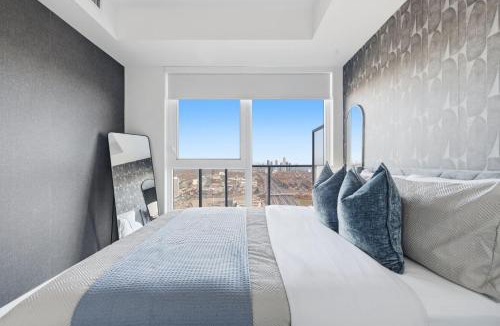 Islington - City Centre West Apartment | Sleek 2BR Condo with Private Patio & Parking
