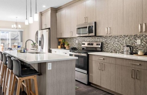 North Central Edmonton House | Spacious 4 BR | Steps to Stadium & Rogers | Garage